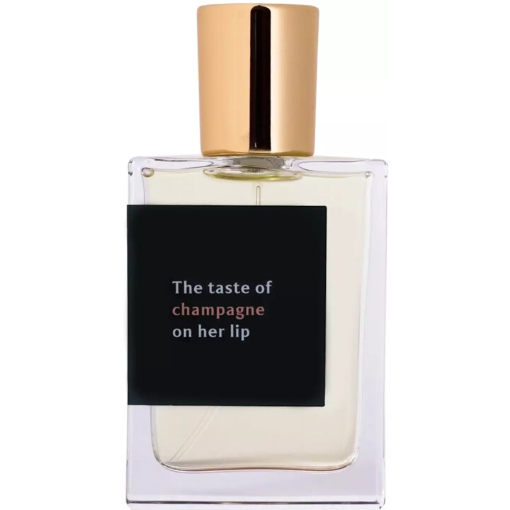 The taste of champagne on her lip by Proad perfume bottle