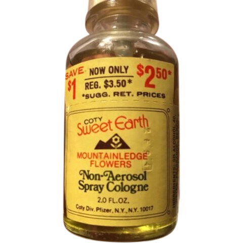Sweet Earth Mountainledge Flowers by Coty perfume bottle