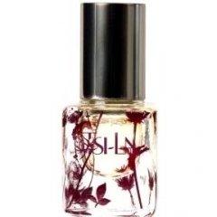 Kizes by Tsi-La Organic perfume bottle