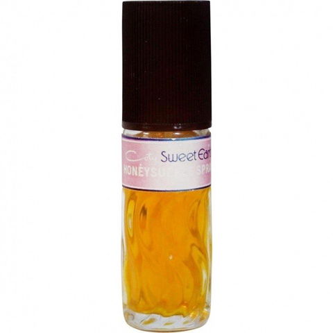 Sweet Earth Honeysuckle by Coty perfume bottle